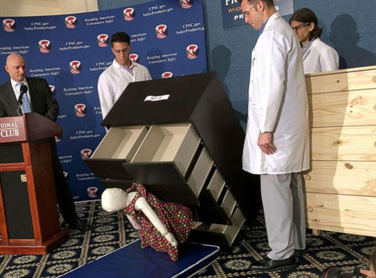 picture of dresser falling on child dummy