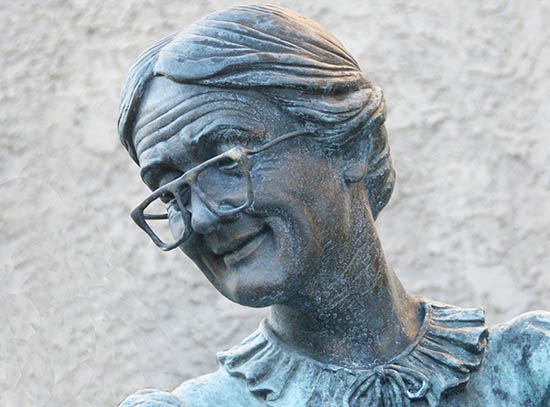 Elderly Care Law Support Image Showing an Old Lady Statue