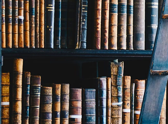 Law Books Header showing a row of Law Books on a Library Shelf