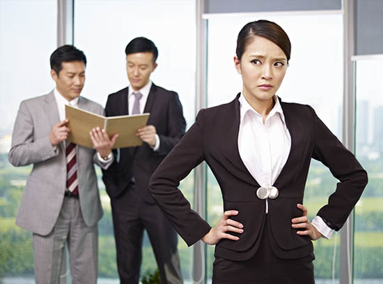 Workplace Discrimination Photo Showing Woman being Discriminated Against